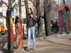 Amateur juvenile Russian girl in jeans voids urine in the park